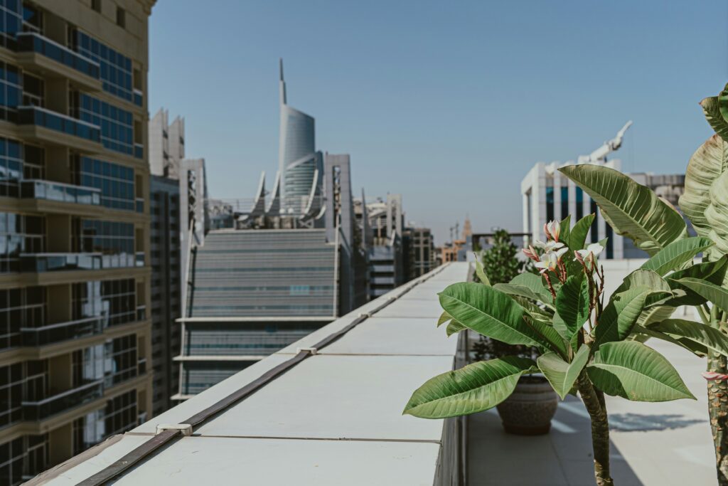 A newly installed, clean white flat roofing system on a modern building